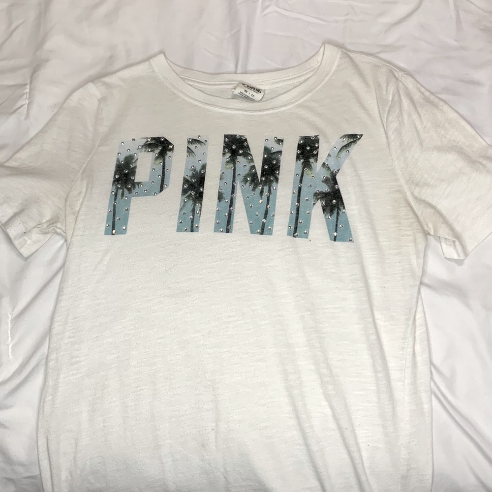 Pink rhinestone shirt.